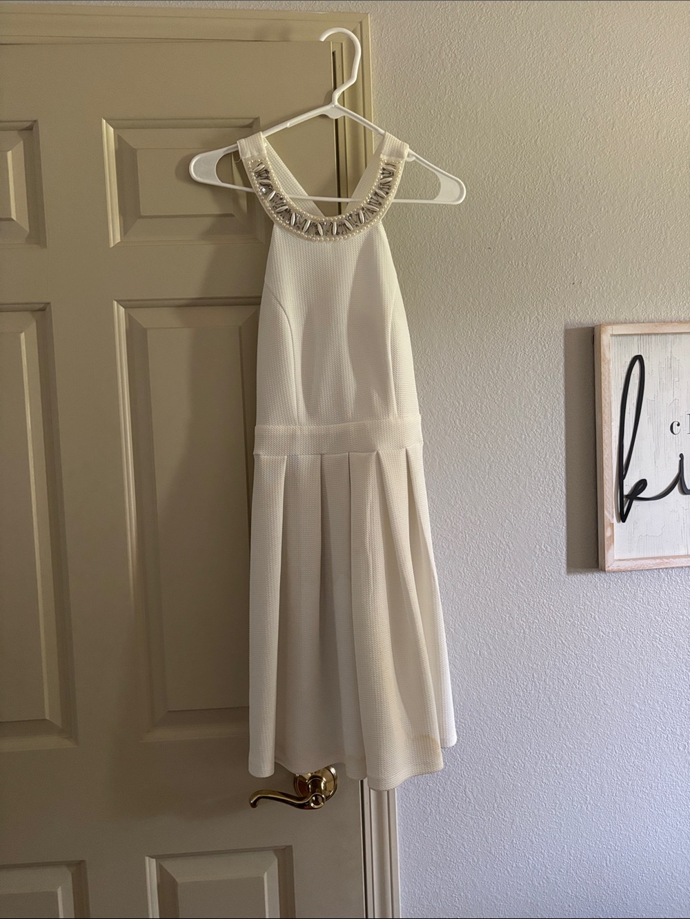 Sleeveless Ivory Beaded Neckline Fit & Flare Dress